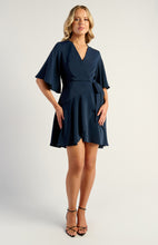 Load image into Gallery viewer, Navy Bell Sleeve Faux Wrap Dress with Layered Hem