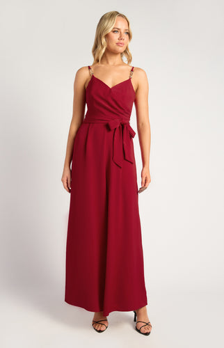 Red Jumpsuit with gold chain detailed strap