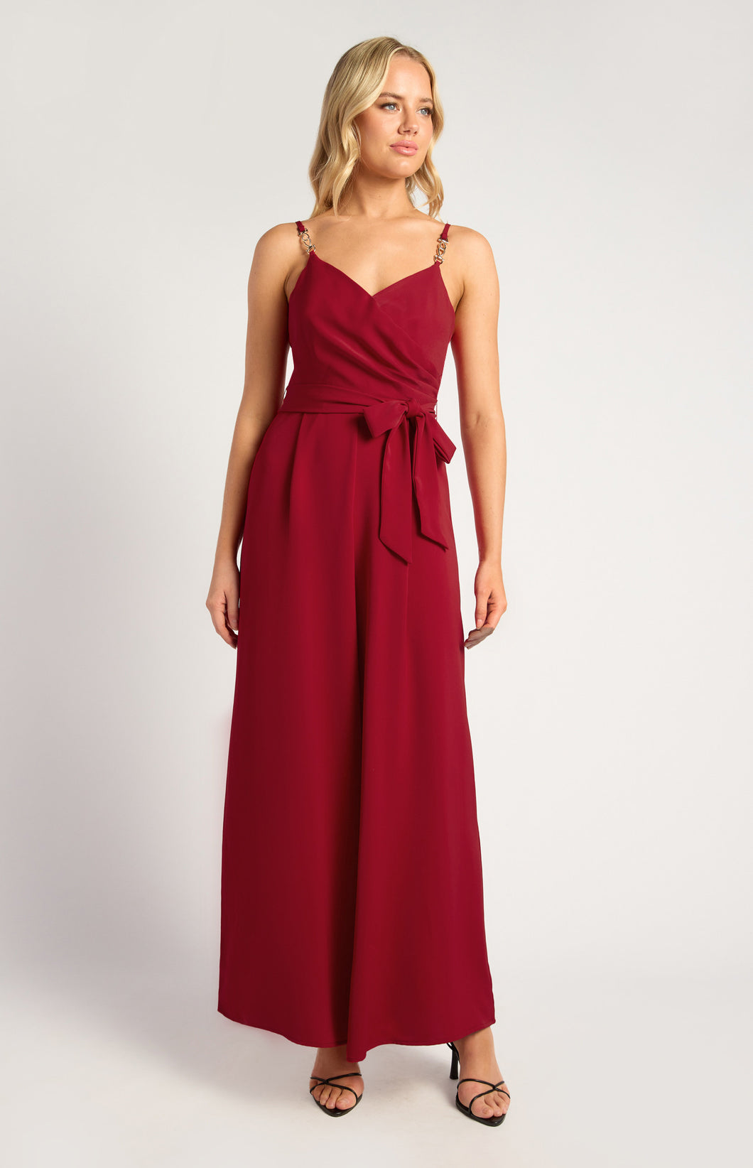 Red Jumpsuit with gold chain detailed strap